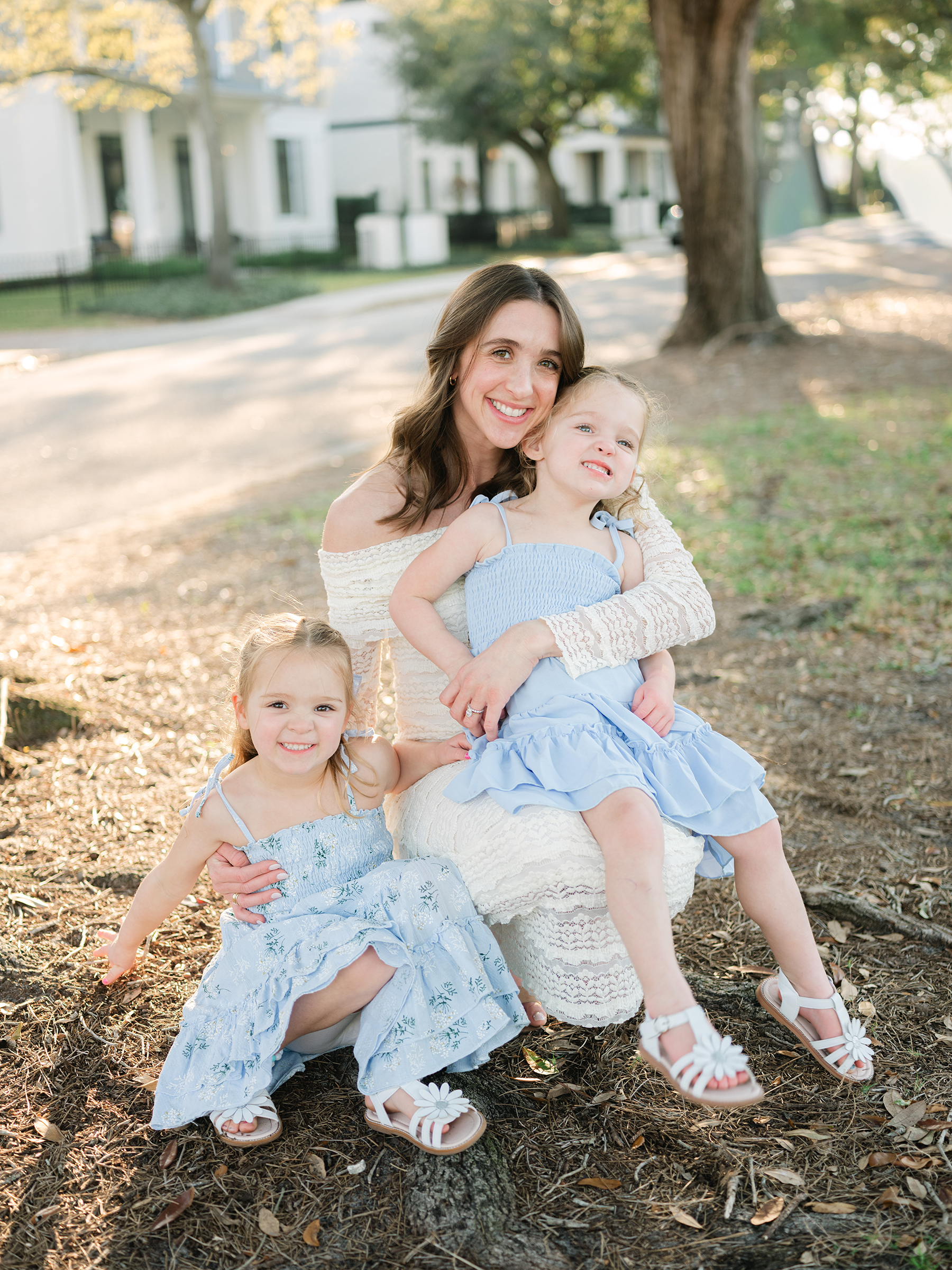 sunlit and bright maternity photo with daughters